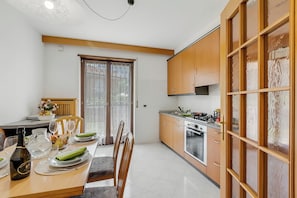 Standard Apartment, 2 Bedrooms, Balcony (The Olive Tree Garden With Mountain) | Private kitchen | Fridge, oven, stovetop, coffee/tea maker