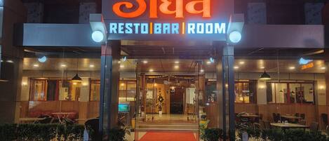 A restaurant with a sign reading "Siddh Restaurant Bar Room".