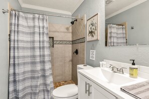 Shower, hair dryer, towels