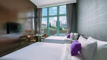Premium bedding, down duvets, desk, laptop workspace
