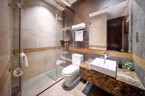 Separate bathtub and shower, hair dryer, slippers, towels