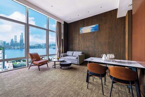 Victoria Harbour Suite | Living area | 40-inch flat-screen TV with digital channels