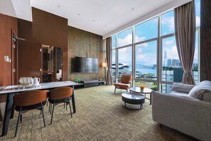 Victoria Harbour Suite | Living area | 40-inch flat-screen TV with digital channels