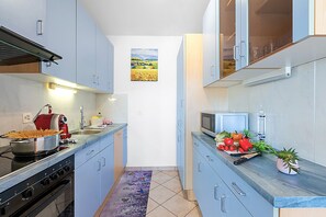 Lägenhet Standard - 1 sovrum - intill bergen (Paradiso Lake View) | Eget kök | Kylskåp, mikrovågsugn, ugn och spishäll