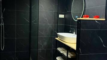 Shower, towels, soap, shampoo