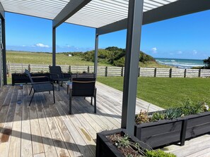 Terrace/patio - The ‘Blue Bach’. Family memories waiting to be made. (Ōpunake)
