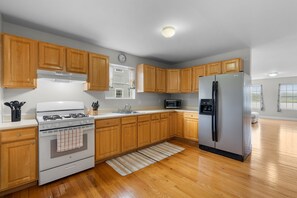 Fridge, microwave, oven, cookware/dishes/utensils