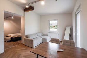 Deluxe Studio Suite, Balcony, Hill View | Living area | Toys