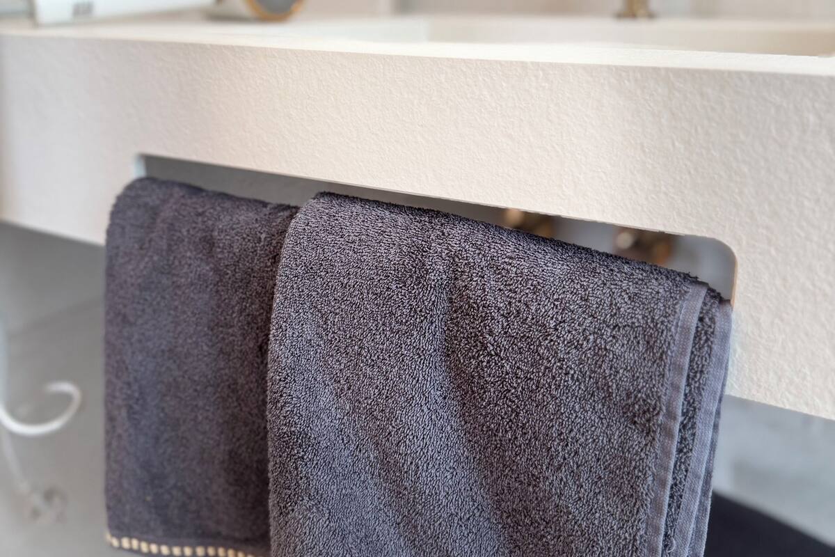 Bathtub, hair dryer, towels, soap