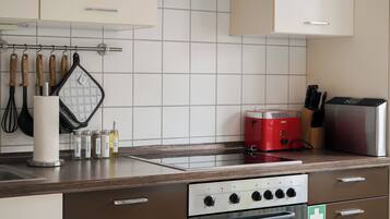 Apartemen Superior | Dapur pribadi | Kursi makan untuk bayi