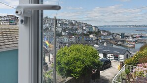 A coastal town with a view of the sea and a harbor. - 2 bedroom accommodation in Brixham (Brixham)