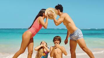 On the beach, white sand, 2 beach bars