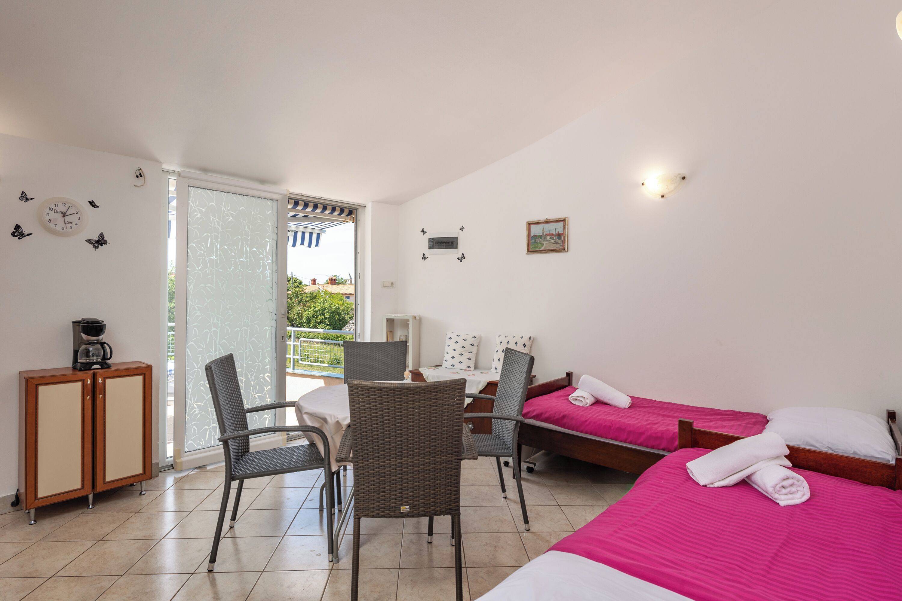 Family Apartment, Multiple Bedrooms (Peaceful Retreat With Terrace 2) | Living room | 32-inch Smart TV with digital channels