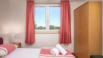 Family Apartment, Multiple Bedrooms (Peaceful Retreat With Terrace 2) | 1 bedroom, iron/ironing board, free WiFi, bed sheets