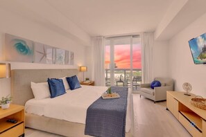 1 bedroom, desk, iron/ironing board, travel crib