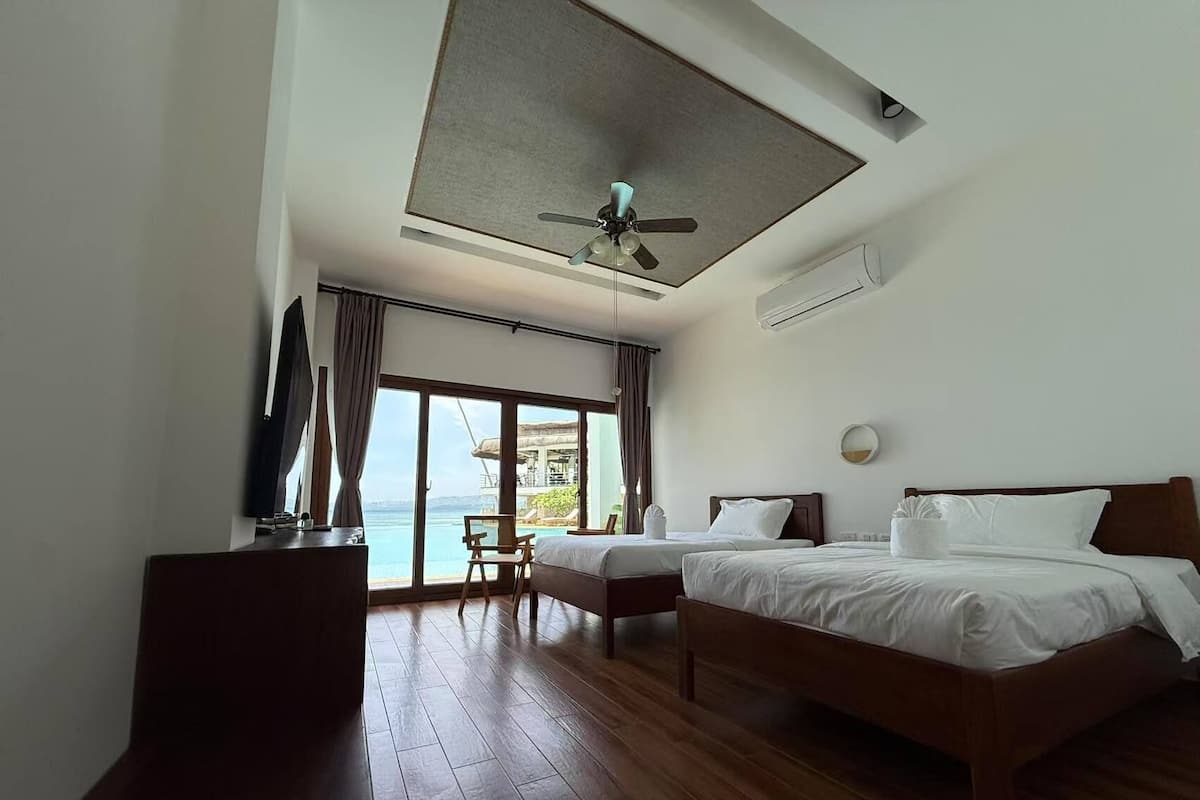 Chambre Luxe avec lits jumeaux, vue plage