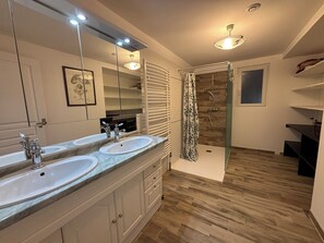 Shower, hair dryer, towels, soap