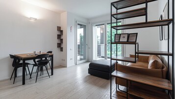 Apartment (1 Bedroom) | Living area | TV