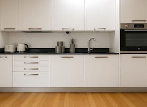 Apartment | Private kitchen | Fridge, microwave, oven, stovetop
