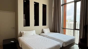 Family Suite, Hill View | In-room safe, desk, blackout drapes, iron/ironing board