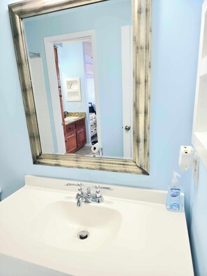 Hair dryer, towels, soap, toilet paper