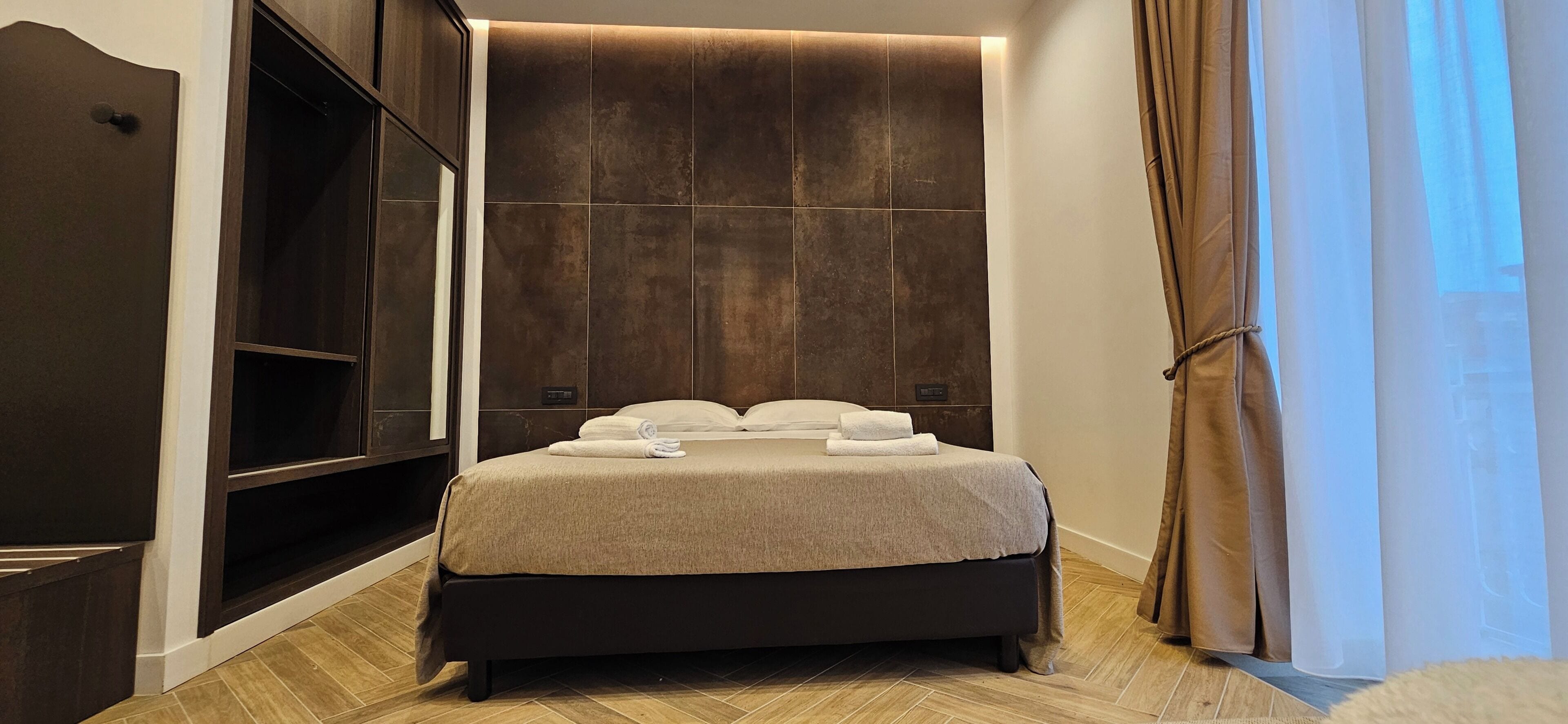 Deluxe Quadruple Room | Hypo-allergenic bedding, pillow-top beds, desk, laptop workspace