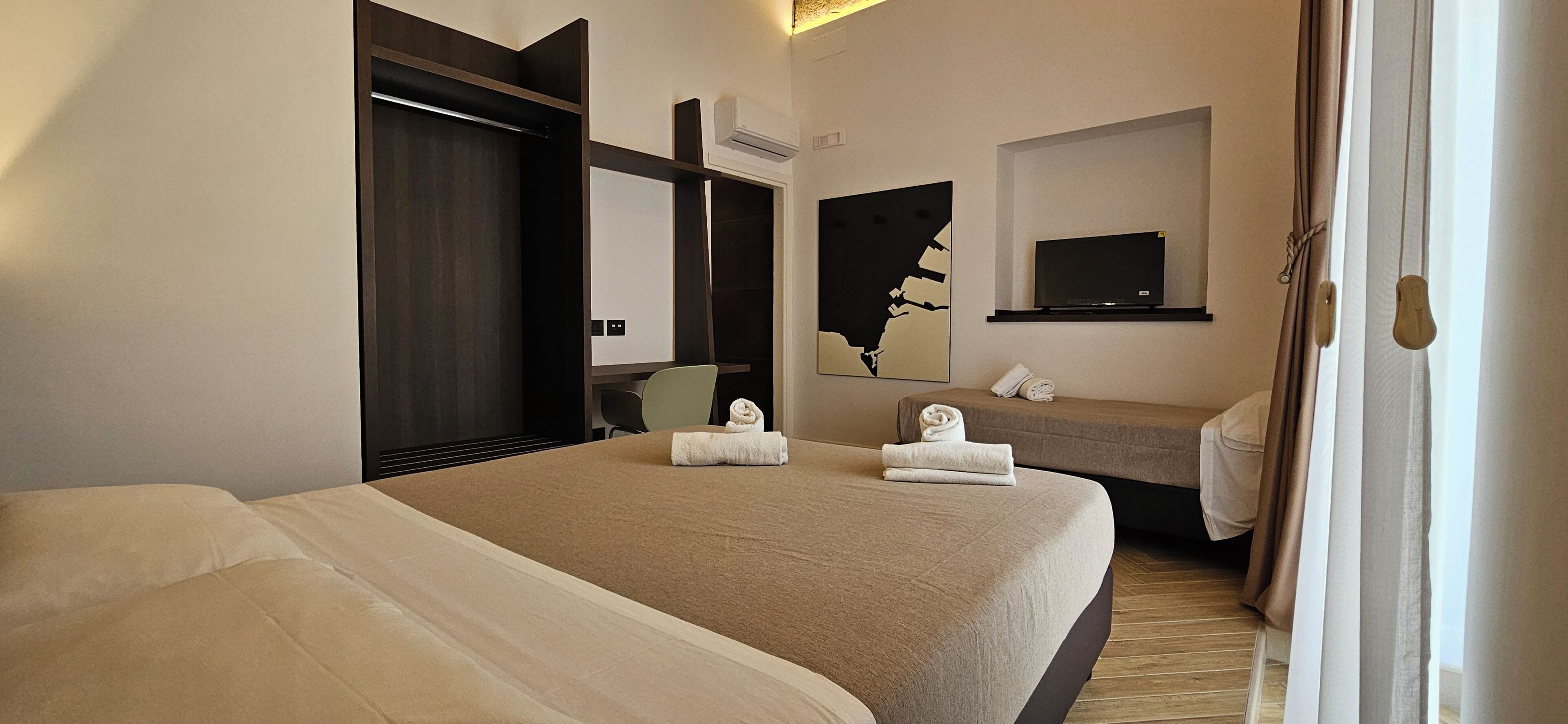 Hypo-allergenic bedding, pillowtop beds, desk, laptop workspace