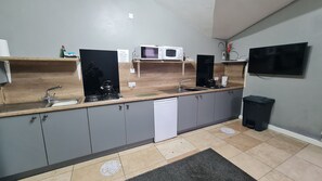 Fridge, microwave, electric kettle, toaster