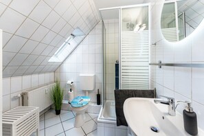 Dutxa, assecador de cabells i tovalloles 