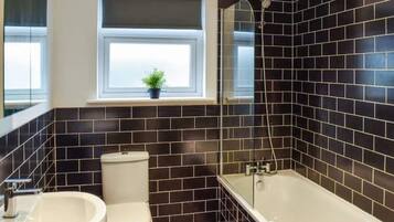 Hair dryer, towels, soap, toilet paper