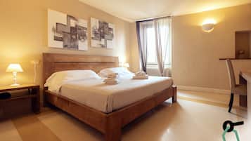 Tweepersoonskamer | Een minibar, gratis babybedden, gratis wifi, beddengoed