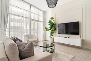 Classic Apartment | Living area | 50-inch Smart TV with digital channels