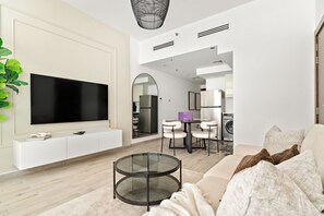 Classic Apartment | Living area | 50-inch Smart TV with digital channels