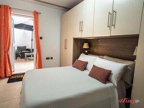 2 habitaciones, tabla de planchar con plancha, cuna de viaje y wifi 