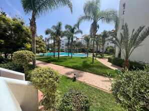 Apartment, 1 Bedroom, Smoking, Patio | Pool | Outdoor pool