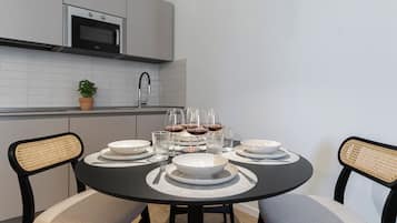 Apartment (1 Bedroom) | Private kitchen | Microwave, espresso maker, electric kettle, high chair
