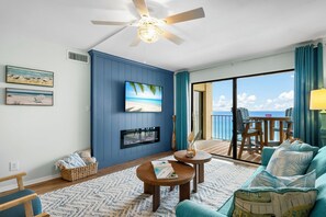 TV, fireplace - Beachfront Regency Heated Pool, Tiki Bar & Hot Tub (Panama City Beach)
