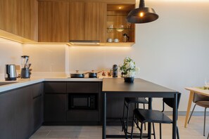 Family Apartment, Balcony, City View | Private kitchen | Highchair