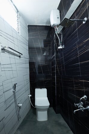 Habitación Deluxe | Baño | Regadera