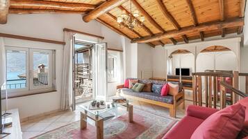 Standard Chalet, 1 Bedroom (Rustico la Staleta) | Living area | 21-inch flat-screen TV with cable channels, fireplace