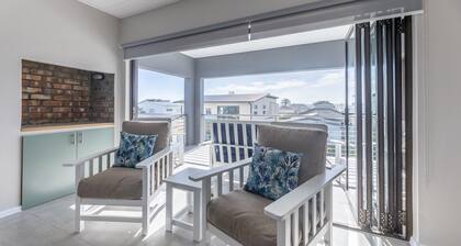 Modern 2-Bedroom Apartment with Stunning Sea Views – Steps from the Beach