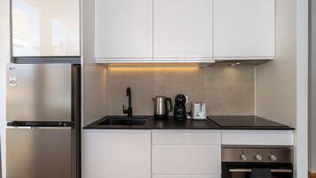 Appartement, balcon, vue ville | Cuisine privée