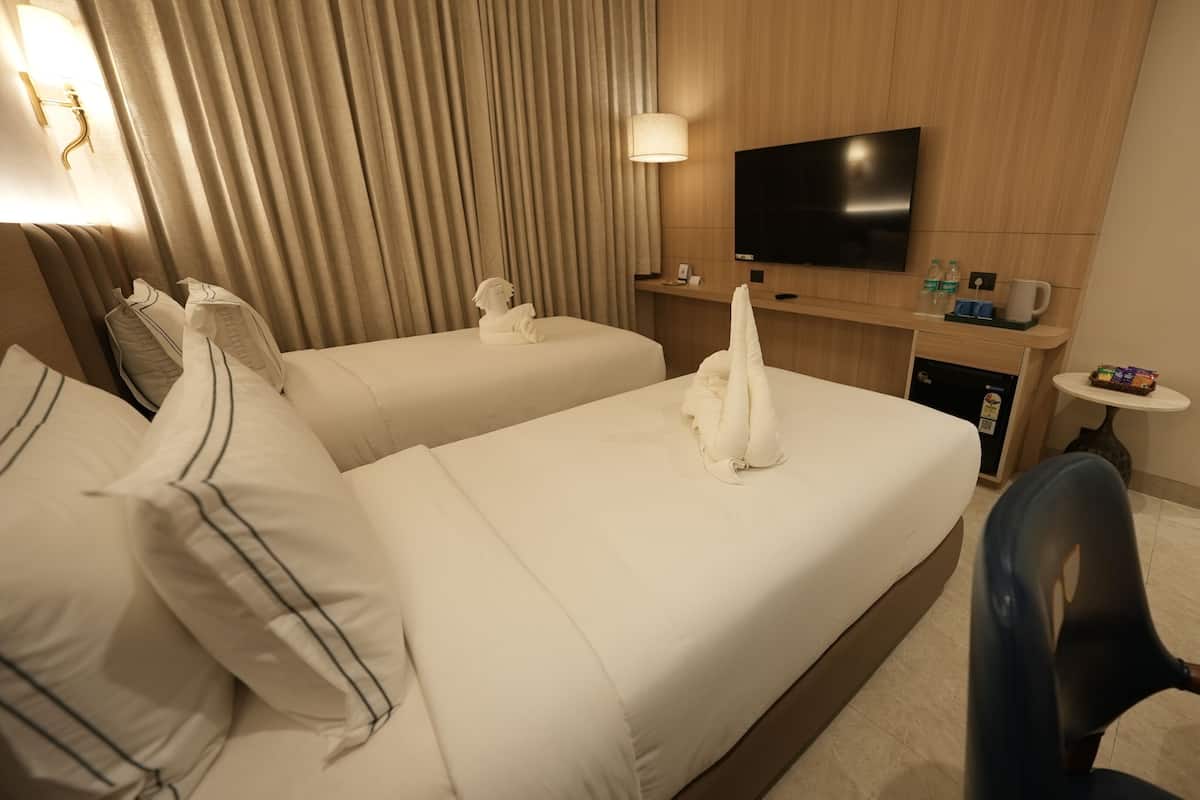 Habitación superior con 2 camas individuales | Wifi gratis