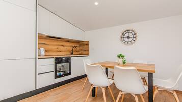 Standard Apartment, Balcony, Courtyard View | Private kitchen | Full-size fridge, microwave, oven, dishwasher