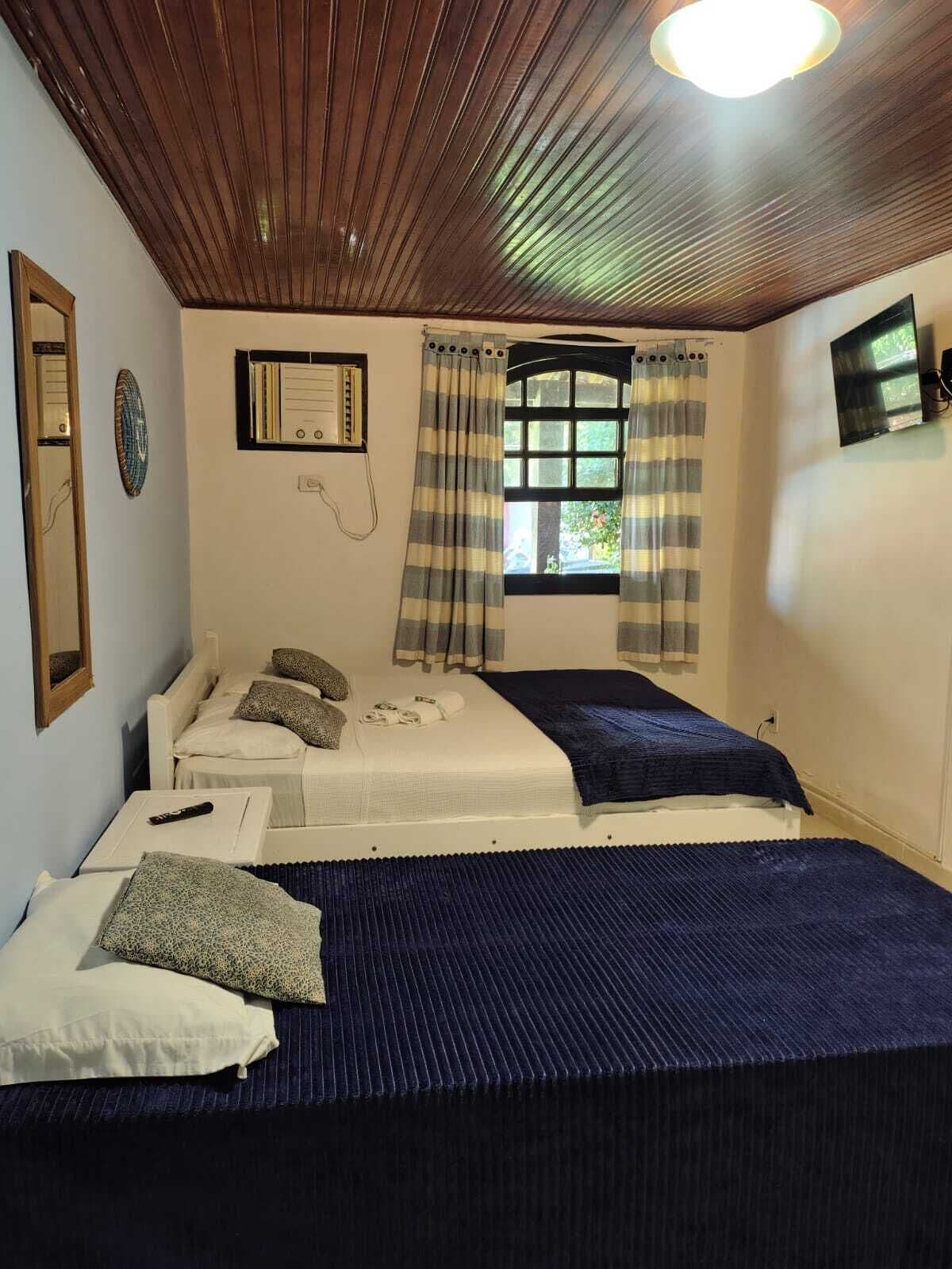Habitación familiar | Cortinas opacas, tabla de planchar con plancha, wifi gratis