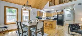 Dock Access + Nearby Beach: Higgins Lake Retreat!