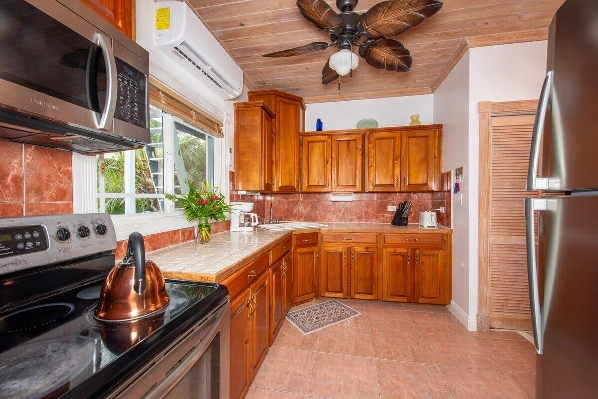 Townhome, 2 Bedrooms | Dapur peribadi | Peti sejuk, ketuhar, pembancuh kopi/teh, pembakar roti 