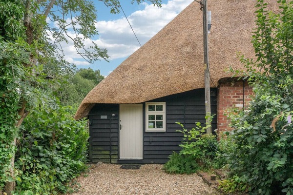 Quaint thatched entrance to your private studio