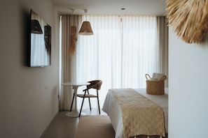 Ropa de cama de alta calidad y minibar 