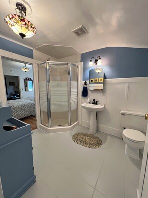 Shower, hair dryer, towels, soap